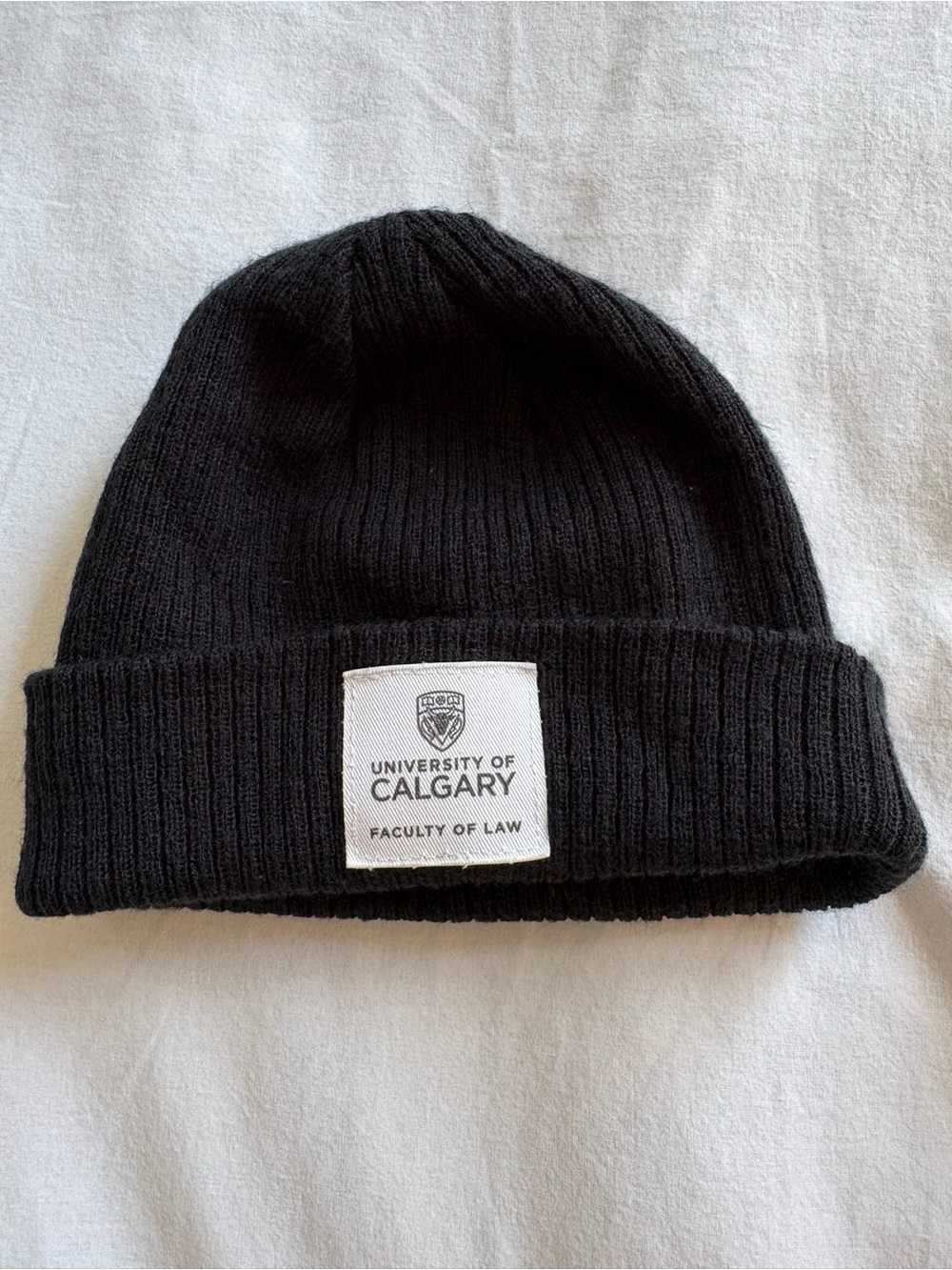 Champion Black Ribbed Beanie with University of Calgary Law logo